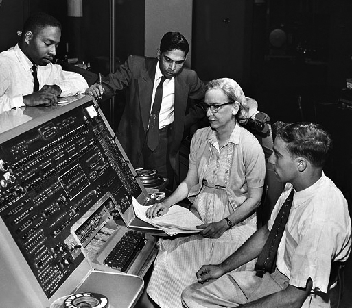SI Neg. 83-14878. Date: na. Grace Murray Hopper at the UNIVAC keyboard, c. 1960. Grace Brewster Murray: American mathematician and rear admiral in the U.S. Navy who was a pioneer in developing computer technology, helping to devise UNIVAC I. the first commercial electronic computer, and naval applications for COBOL (common-business-oriented language). Credit: Unknown (Smithsonian Institution)